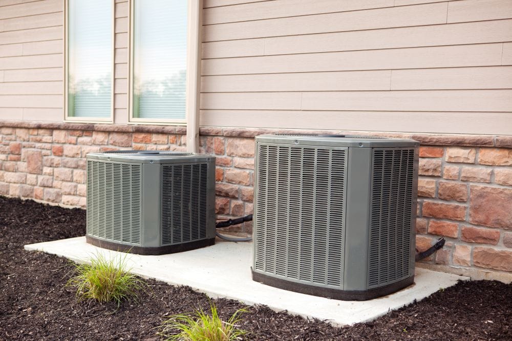 HVAC systems outside a new home.