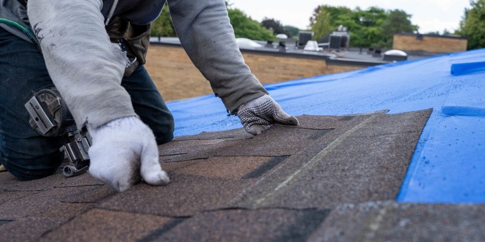 Roofing contractor at work.