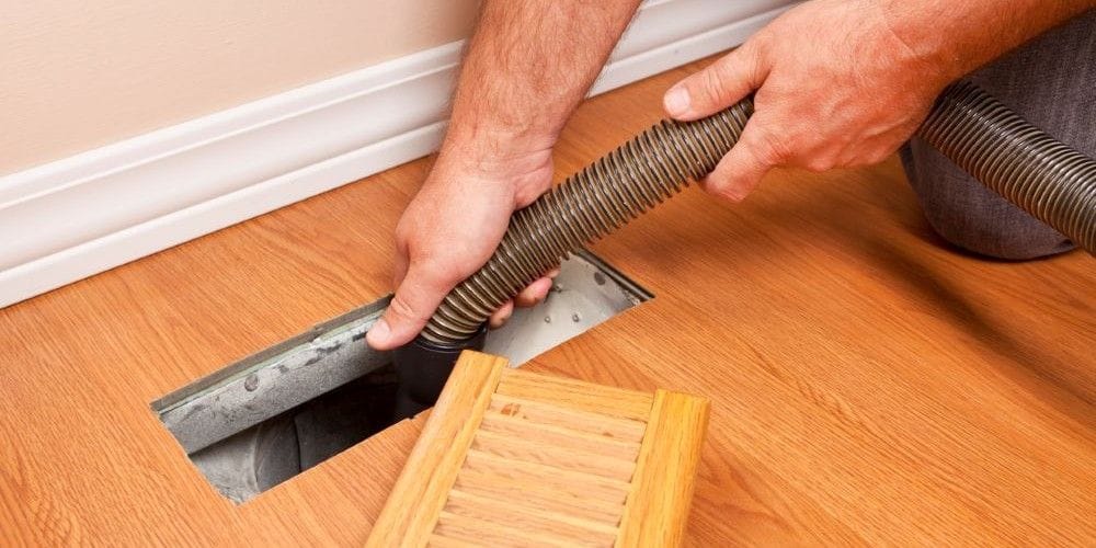 Air duct cleaning by a professional from Home Safe Air Duct & Dryer Vent Cleaning.