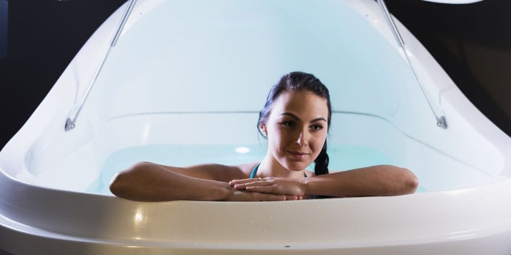 Woman relaxing in a float spa.