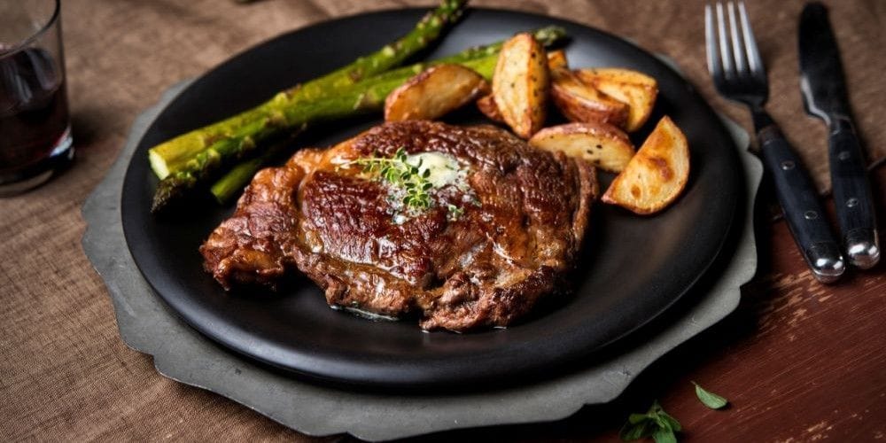 Steak served at the table.